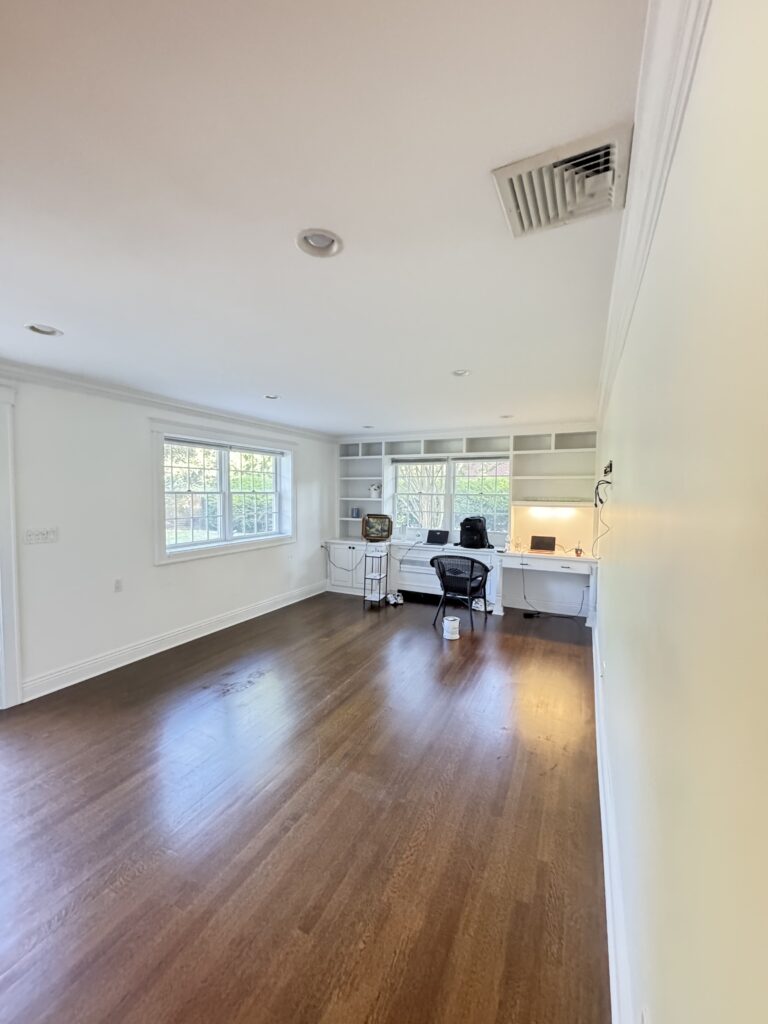 Den room painting in Garden City, NY
